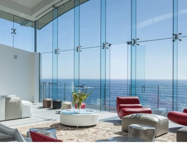 Hệ mặt dựng Spider cho tòa nhà mặt tiền bằng kính